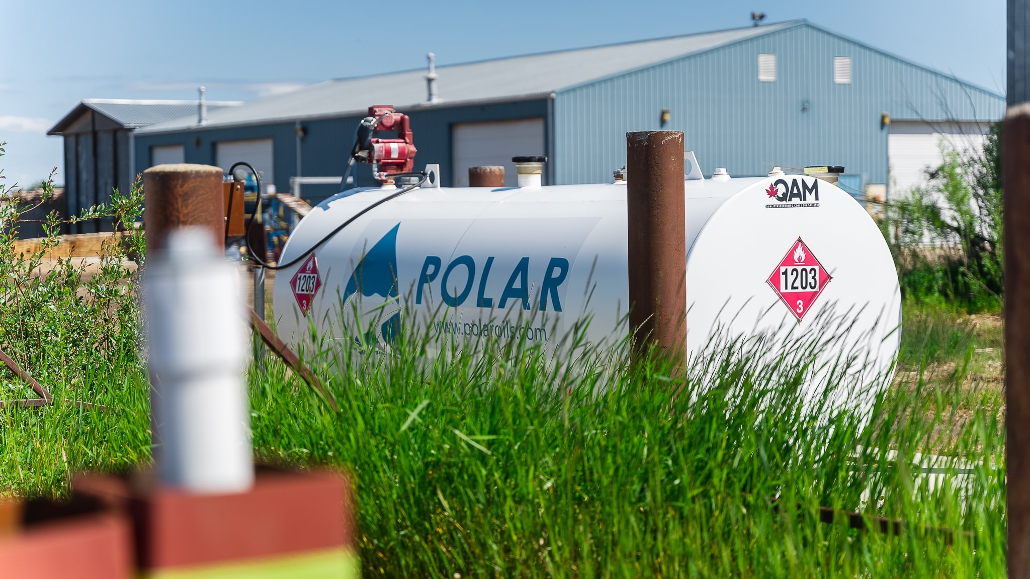White tank with POLAR branding outdoors