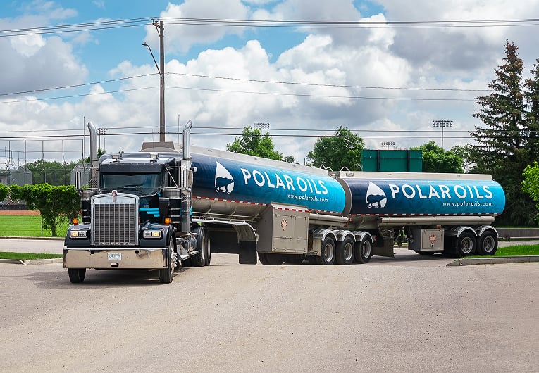 Retail Fuel Truck delivering oil with trailers