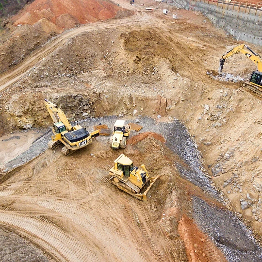 Construction site with heavy machinery.