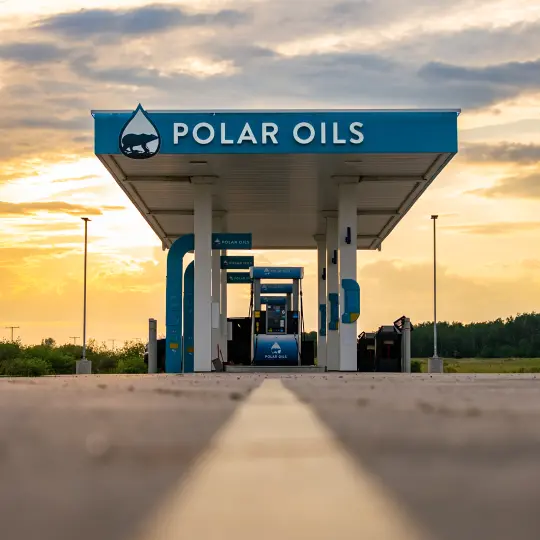 Gas station at sunset with logo