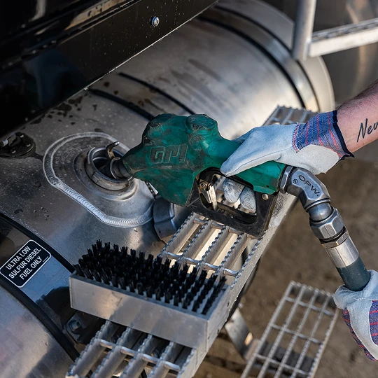 Fueling a tank with a nozzle