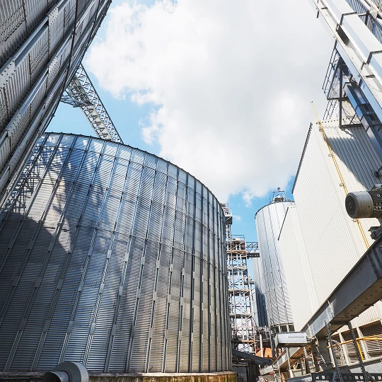 Industrial buildings under a blue sky