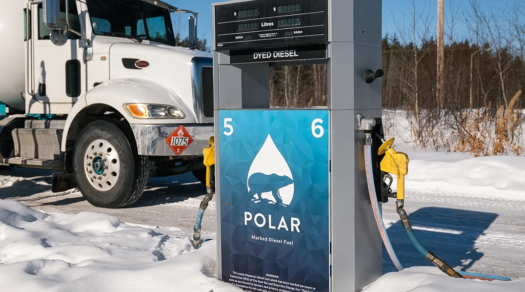 Diesel pump next to a truck